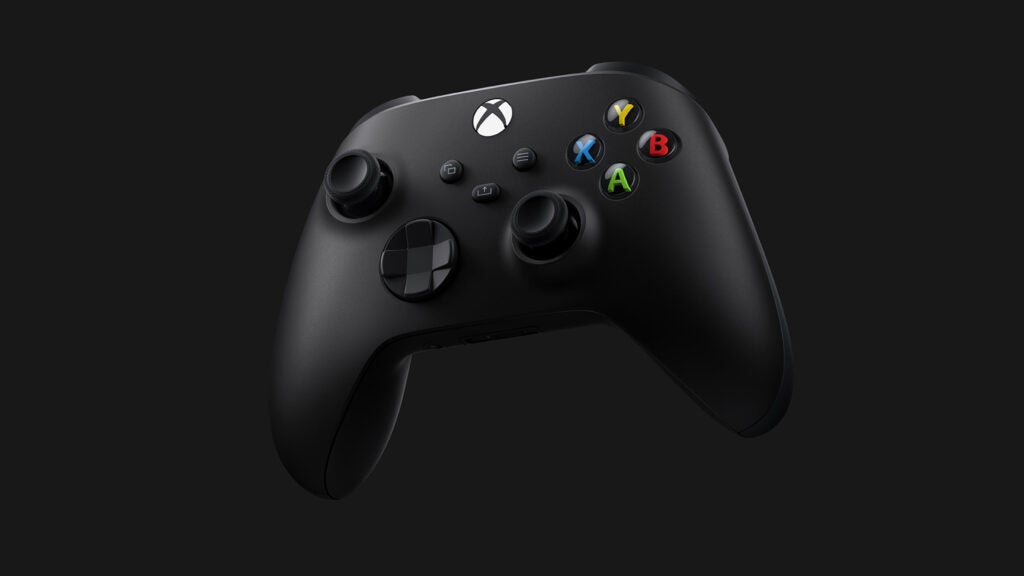 Un contrôleur Xbox série X noir flottant sur fond noir