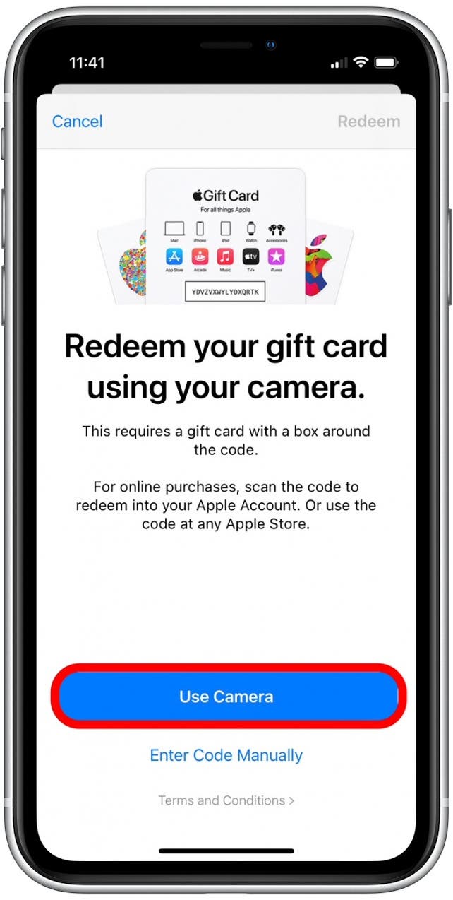 Appuyez sur Utiliser l'appareil photo pour utiliser la carte-cadeau iTunes avec le partage familial.  