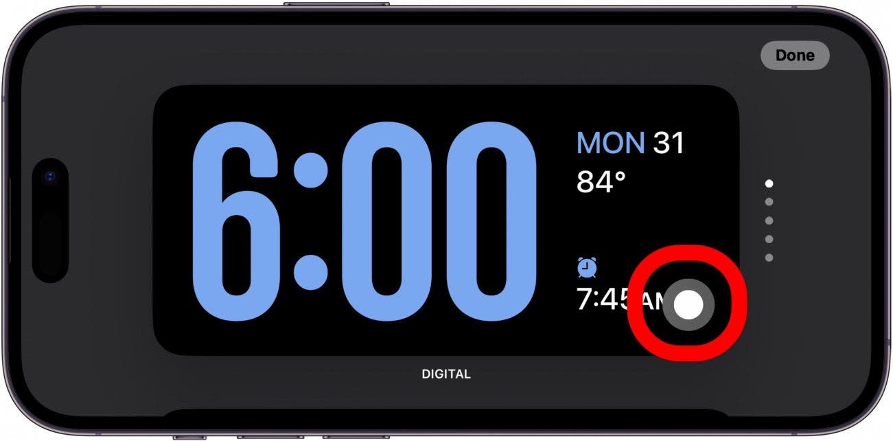 écran d'horloge de veille iphone avec icône de couleur d'horloge entourée en rouge