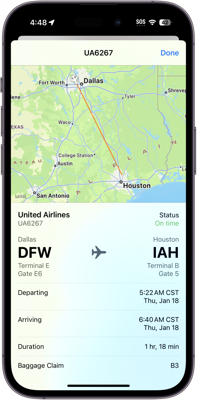 Fenêtre des détails du vol sur iPhone affichant des informations sur un vol Dallas Fort Worth à destination de Houston