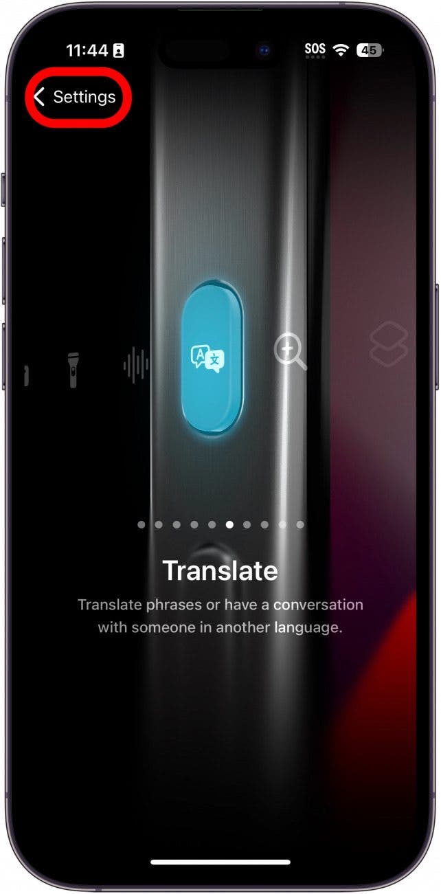 Paramètres du bouton d'action de l'iPhone affichant l'icône de traduction avec un cadre rouge autour du bouton des paramètres