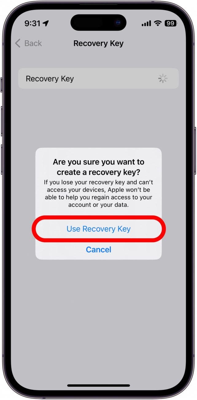 Écran de clé de récupération de compte iPhone affichant une fenêtre contextuelle demandant si l'utilisateur est sûr de vouloir activer cette fonctionnalité, avec un cadre rouge autour de l'utilisation de la clé de récupération